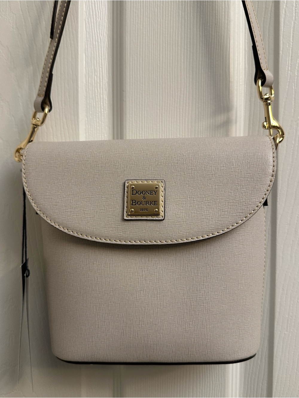 Dooney & Bourke Ecru Saffiano Leather Binocular Bag with Gold-Tone Plaque